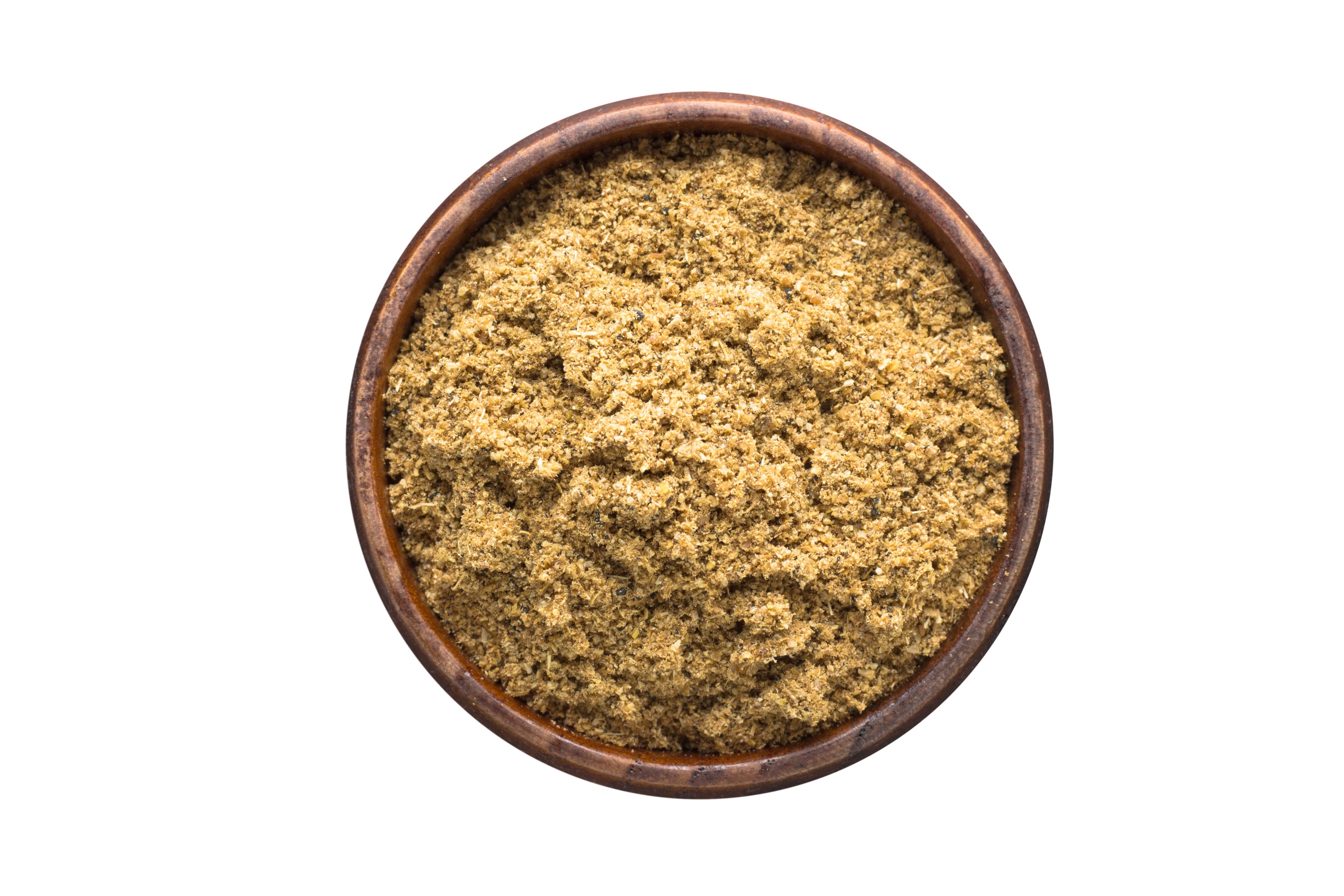 Cumin powder in wooden bowl on white background