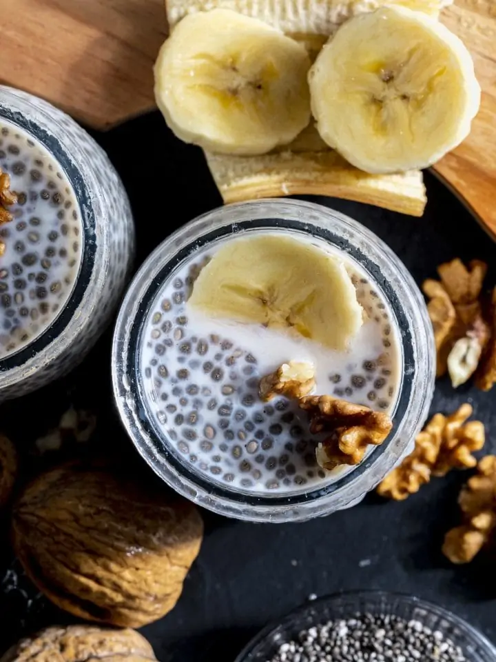 Healthy chia seed pudding with fresh blueberries bananas and walnuts