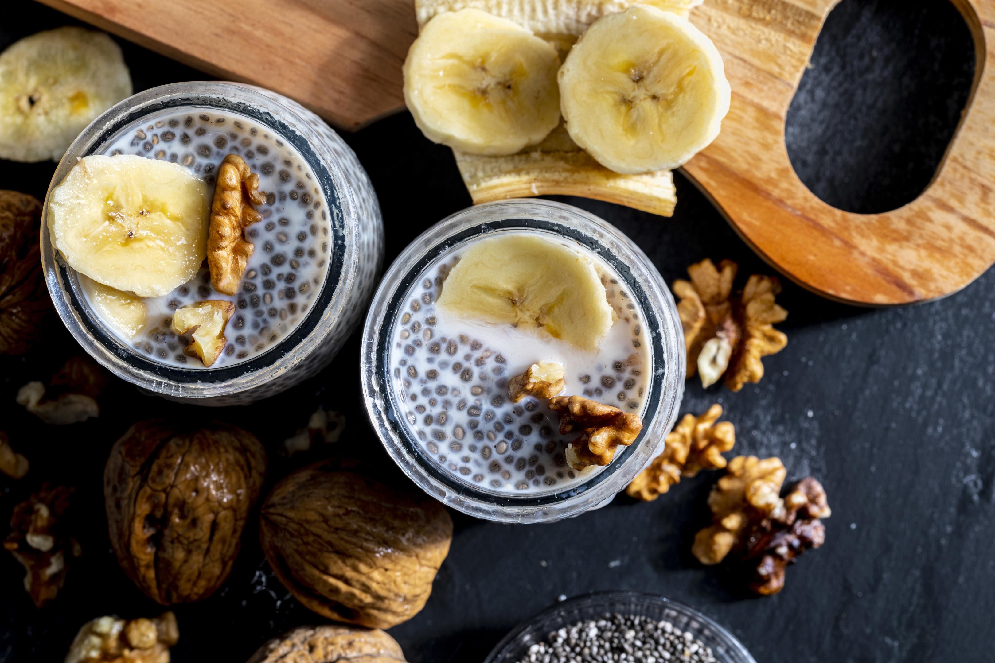 Healthy chia seed pudding with fresh blueberries bananas and walnuts