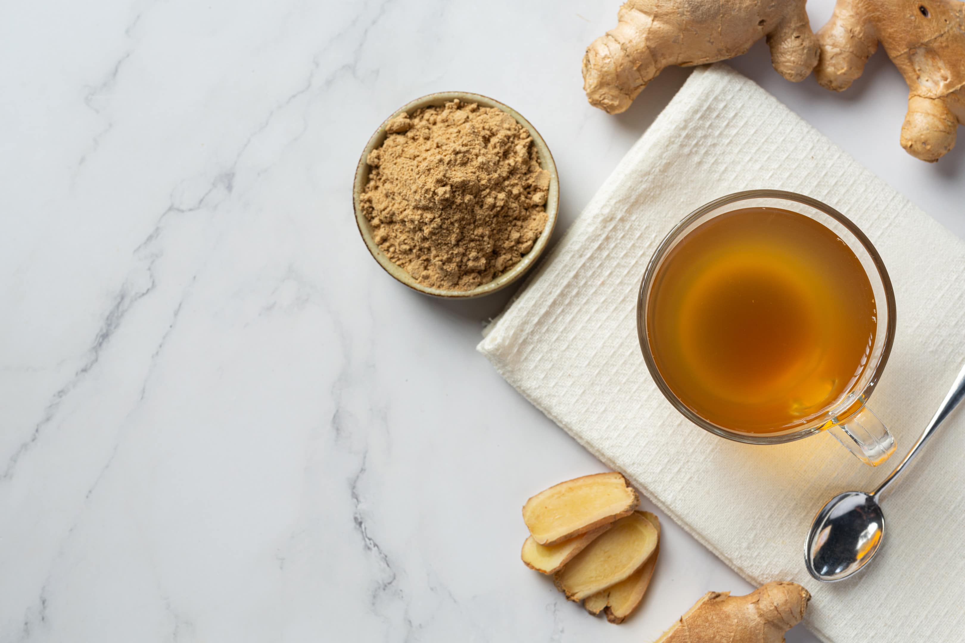 Hot ginger tea with fresh ginger