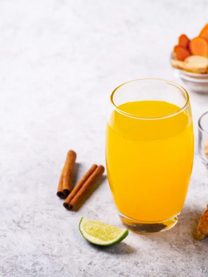 Turmeric tamarind and ginger drink with lime