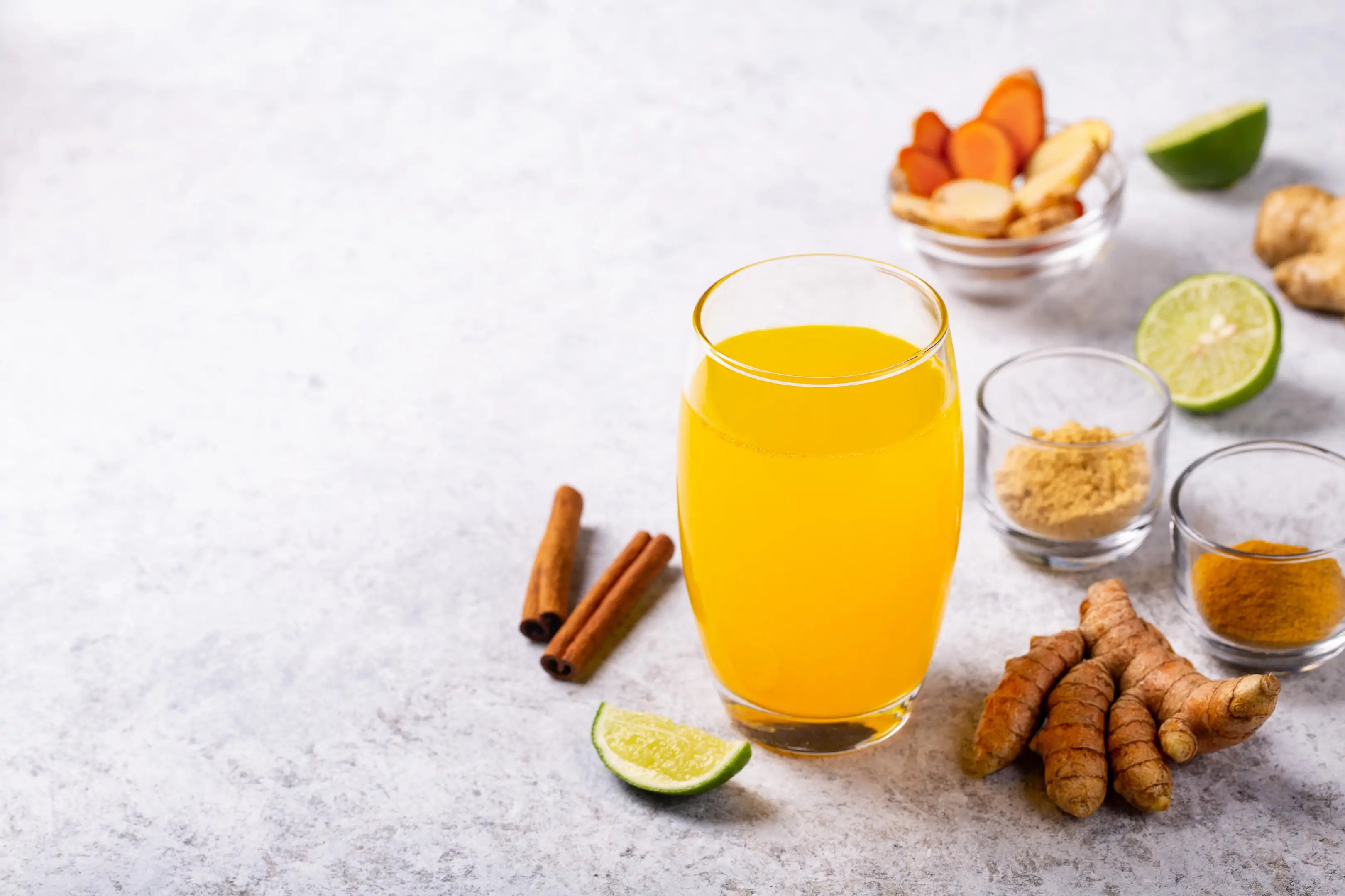 Turmeric tamarind and ginger drink with lime