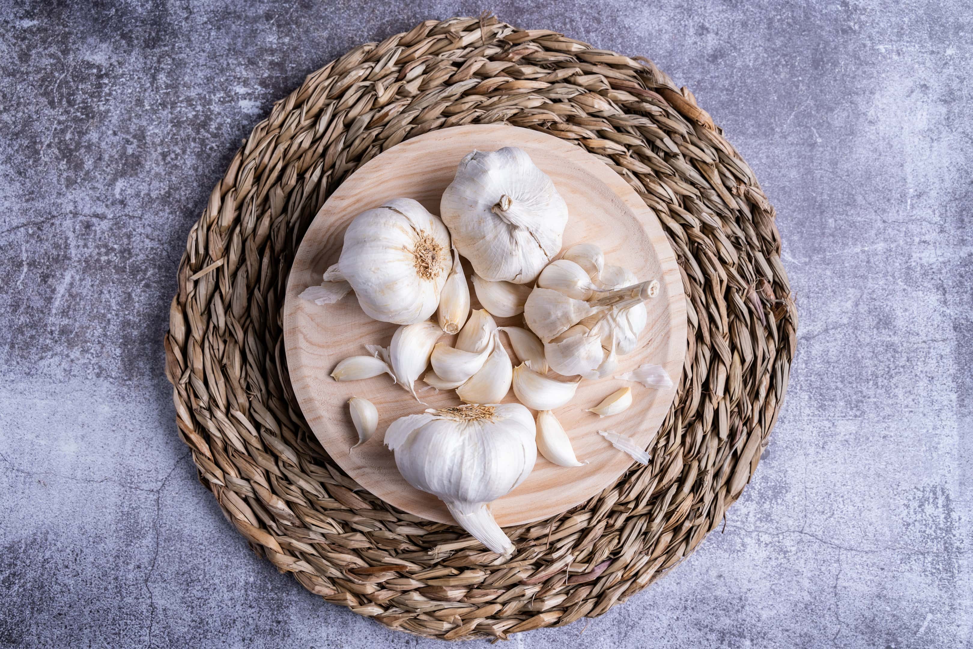 White garlic on cutting board