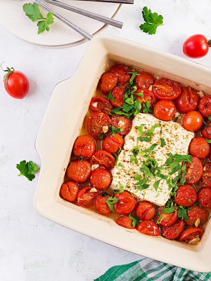 Baked cherry tomatoes, feta cheese, garlic, herbs and olive oil