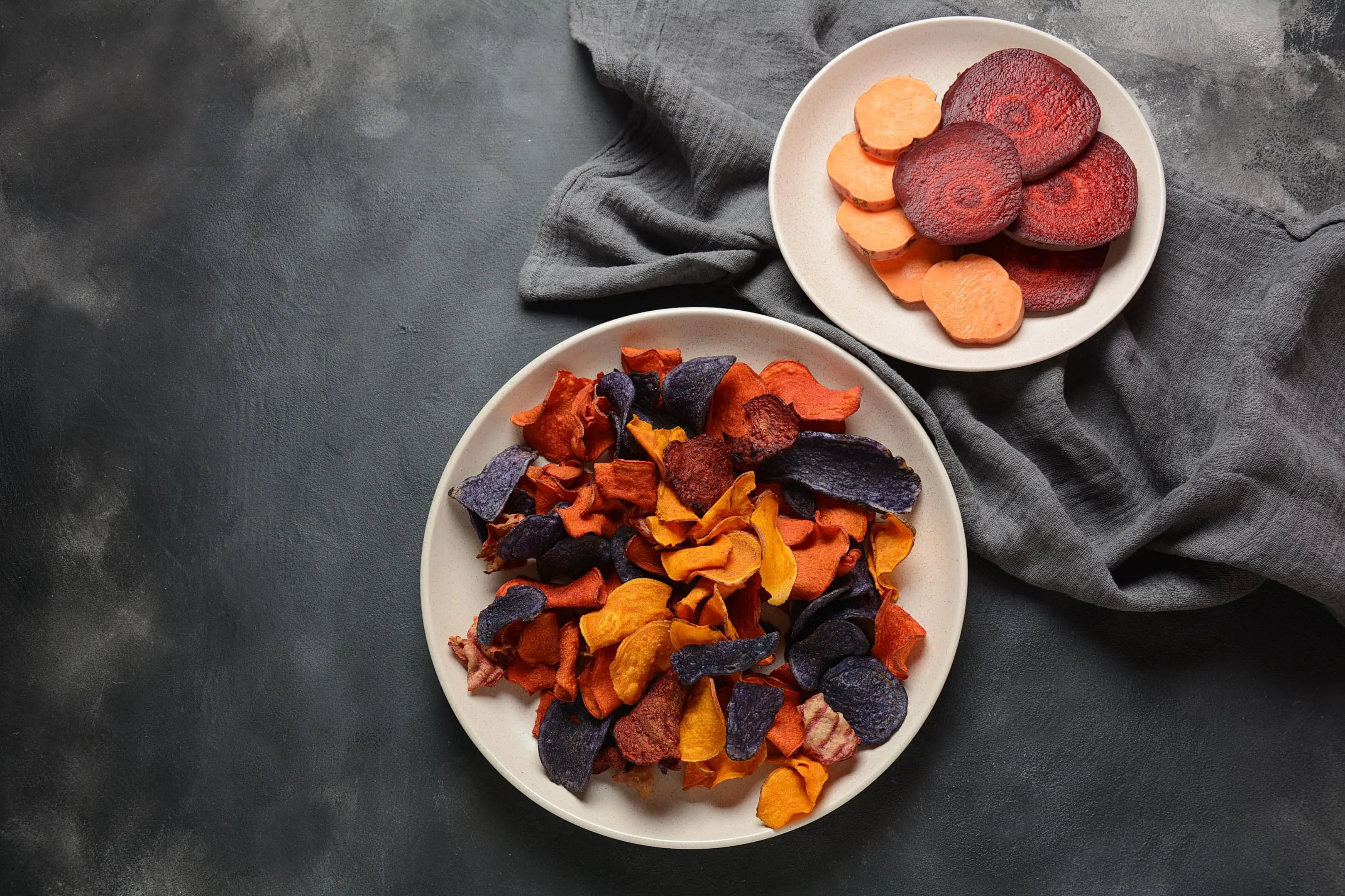 Salt-free baked root vegetable chips — sweet potato, purple sweet potato, carrot and beetroot