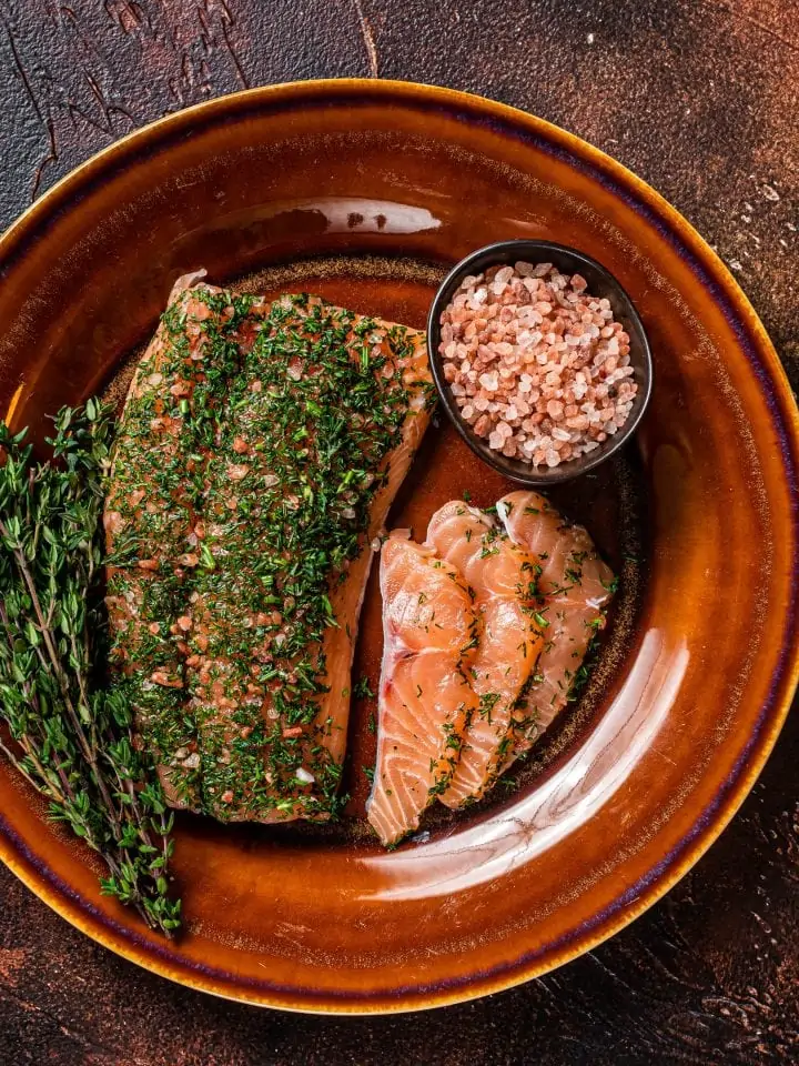 Wild salmon gravlax cured with dill and pink salt