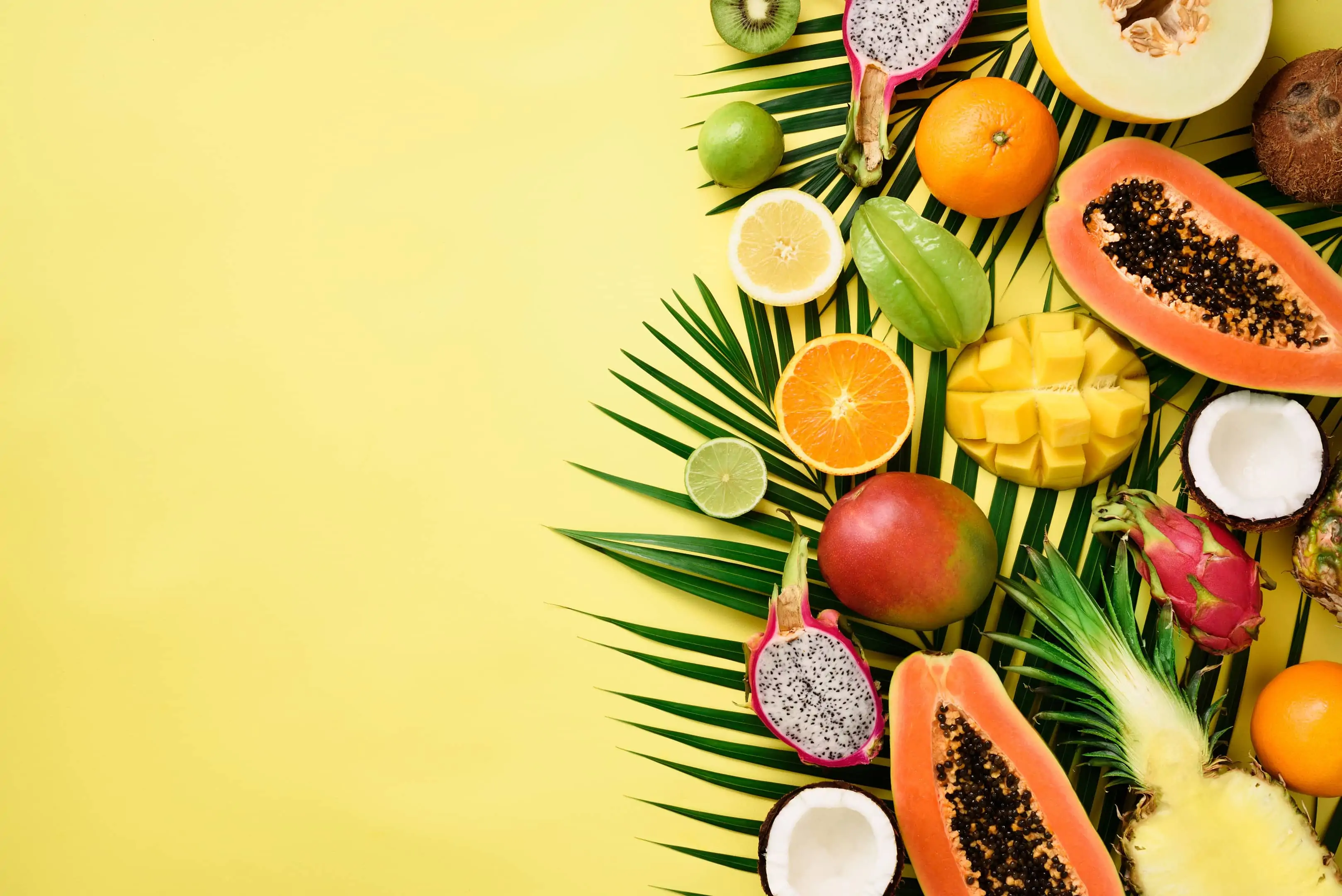 Tropical fruits — papaya, mango, pineapple, carambola, dragon fruit, kiwi, lemon, orange, melon, coconut and lime