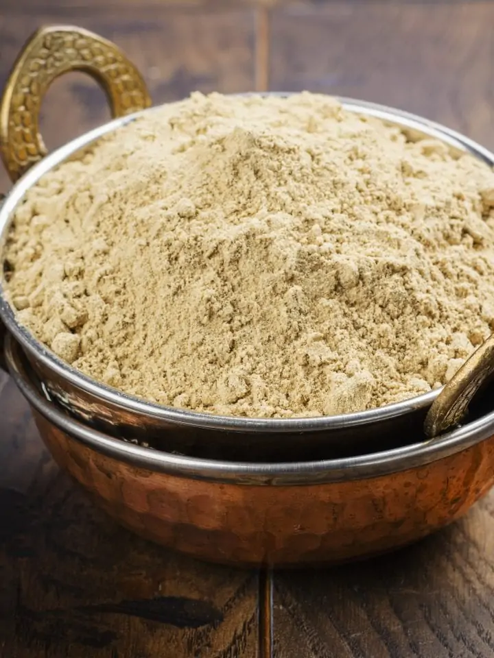 Mesquite powder in a metal bowl