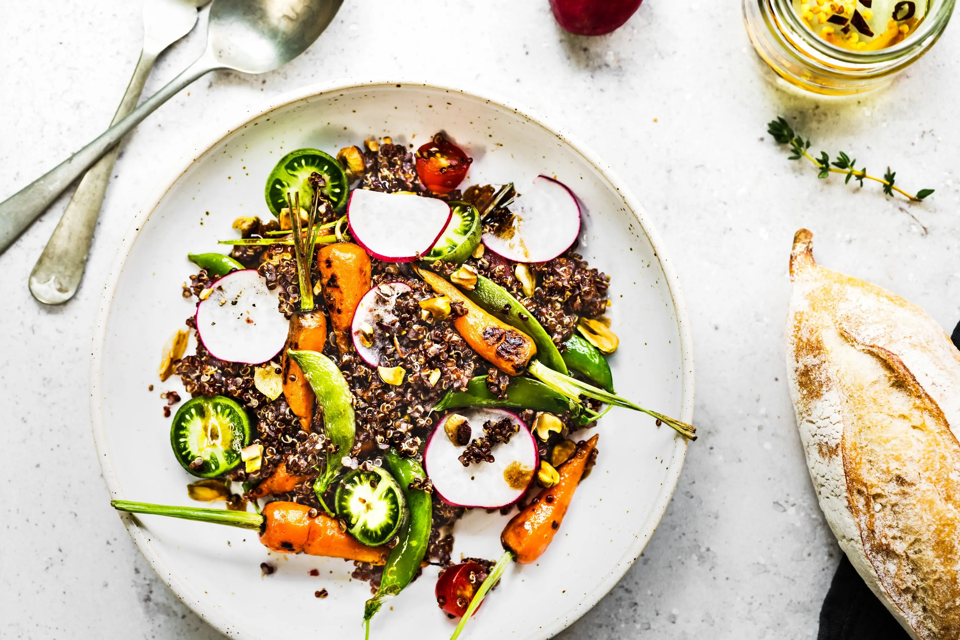 Quinoa salad with grilled baby carrot ,snap pea, radish and olive oil