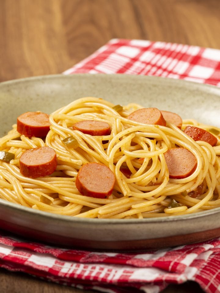 Jollibee spaghetti recipe — pasta with sliced hot dogs and tomato sauce