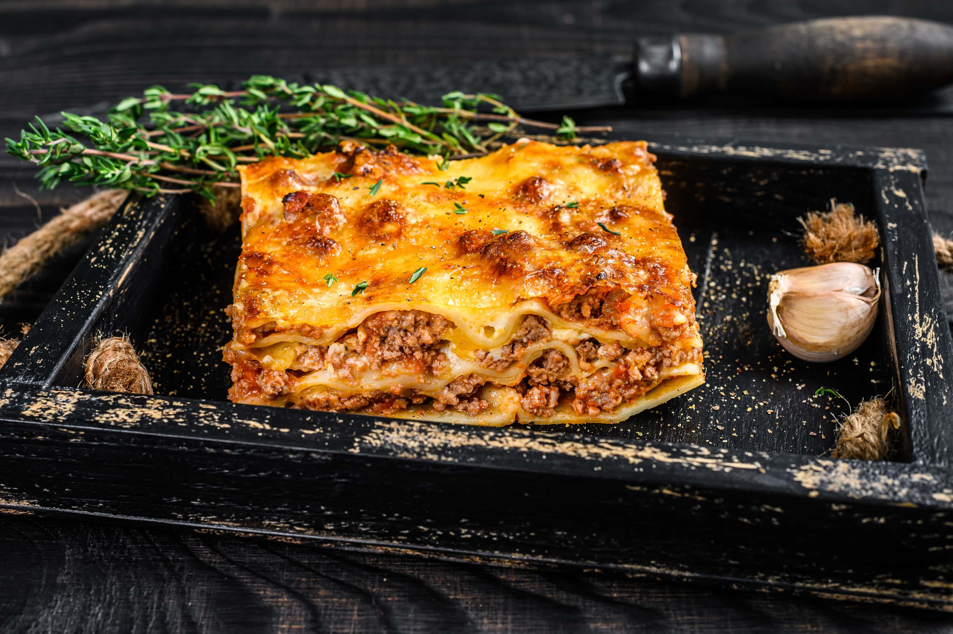 Portion of lasagna with mince beef and Bolognese sauce