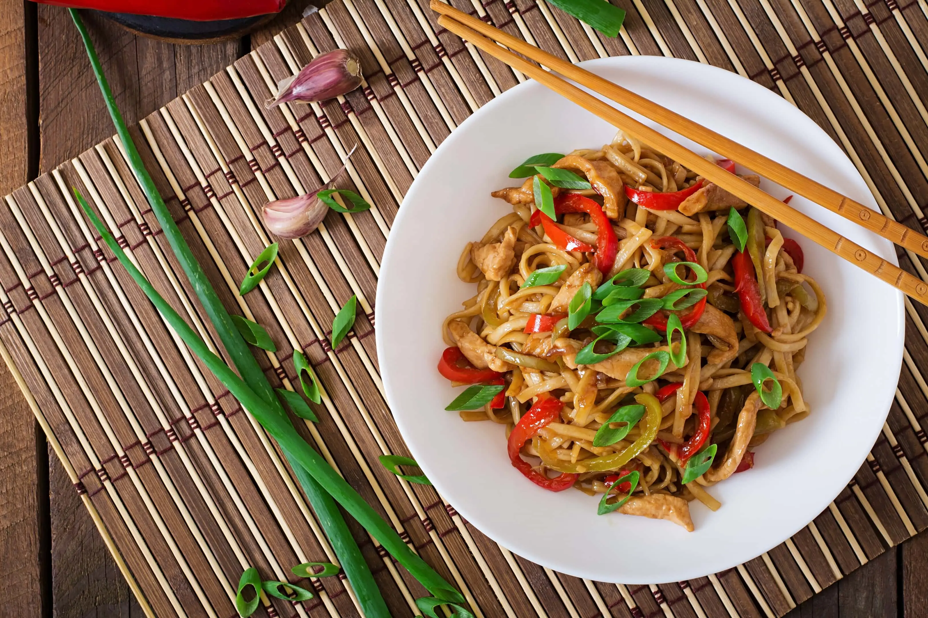 Udon noodles with chicken peppers and seasonings. Udon is one on our list of food that starts with u.