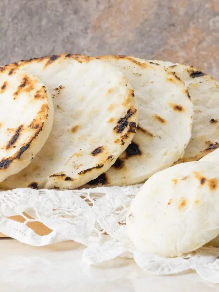 Tasty arepas con queso in different sizes