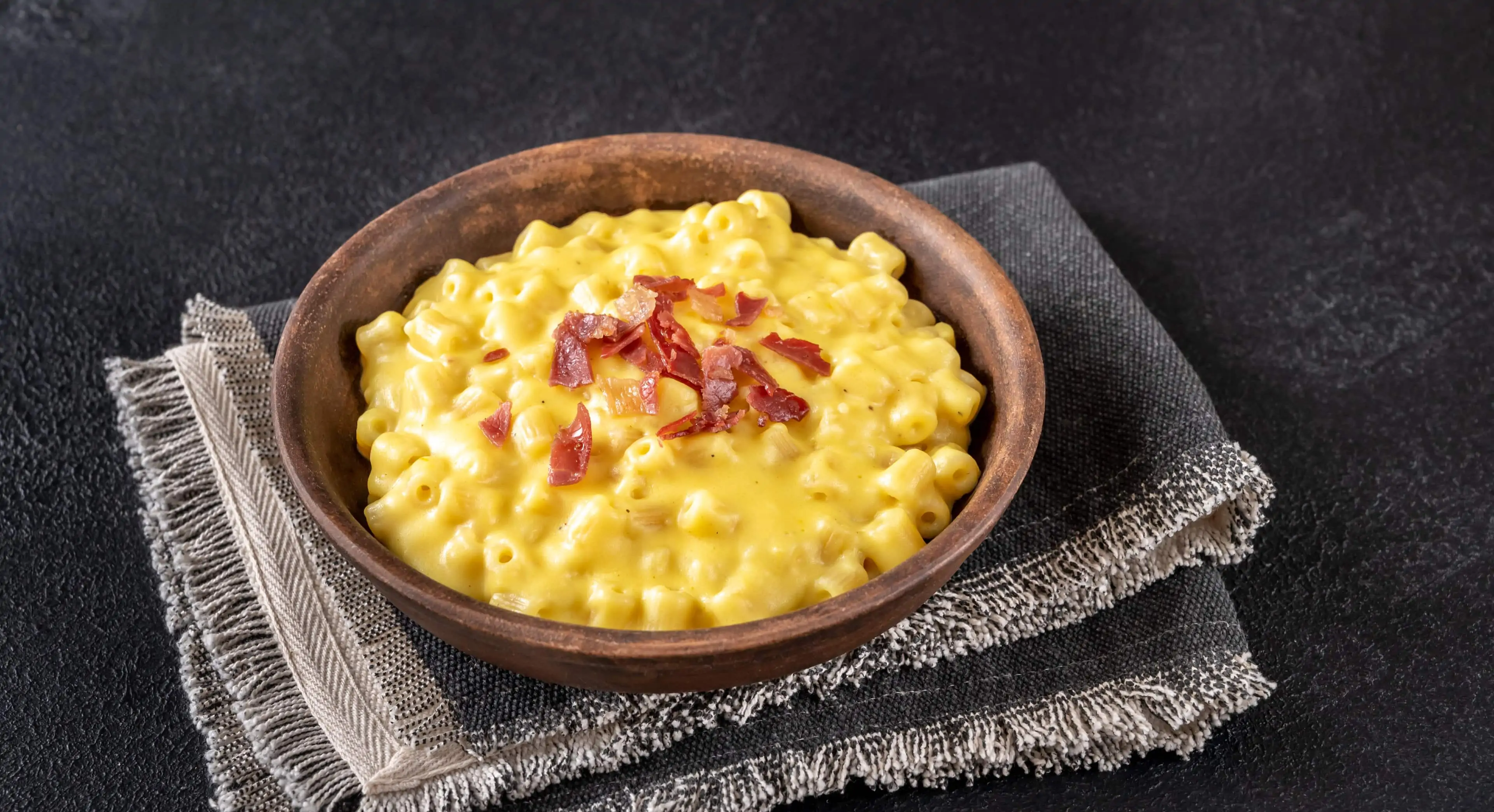 A bowl of Morrisons macaroni cheese with fried bacon