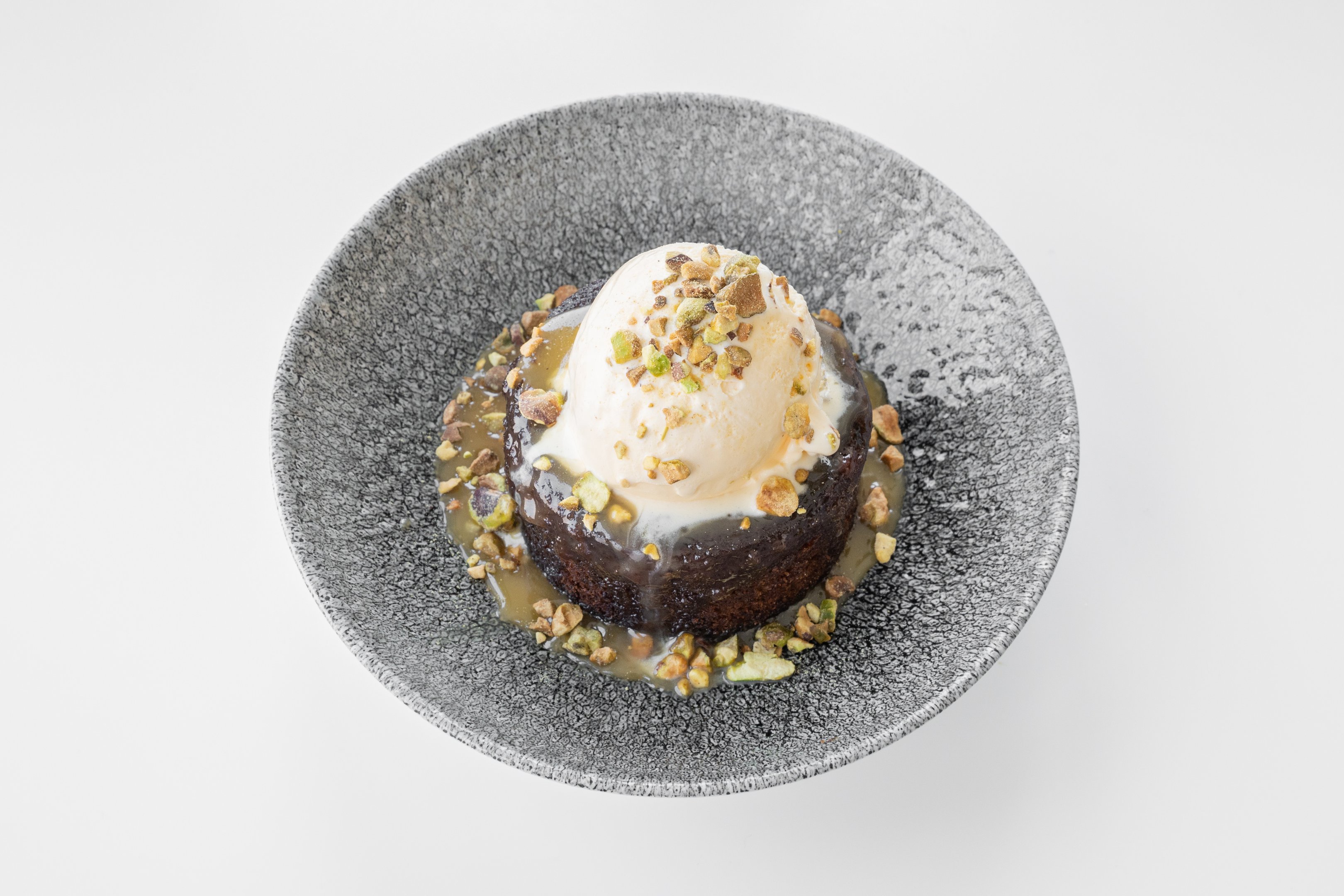 Delicious Gordon Ramsay sticky toffee pudding recipe with garnish