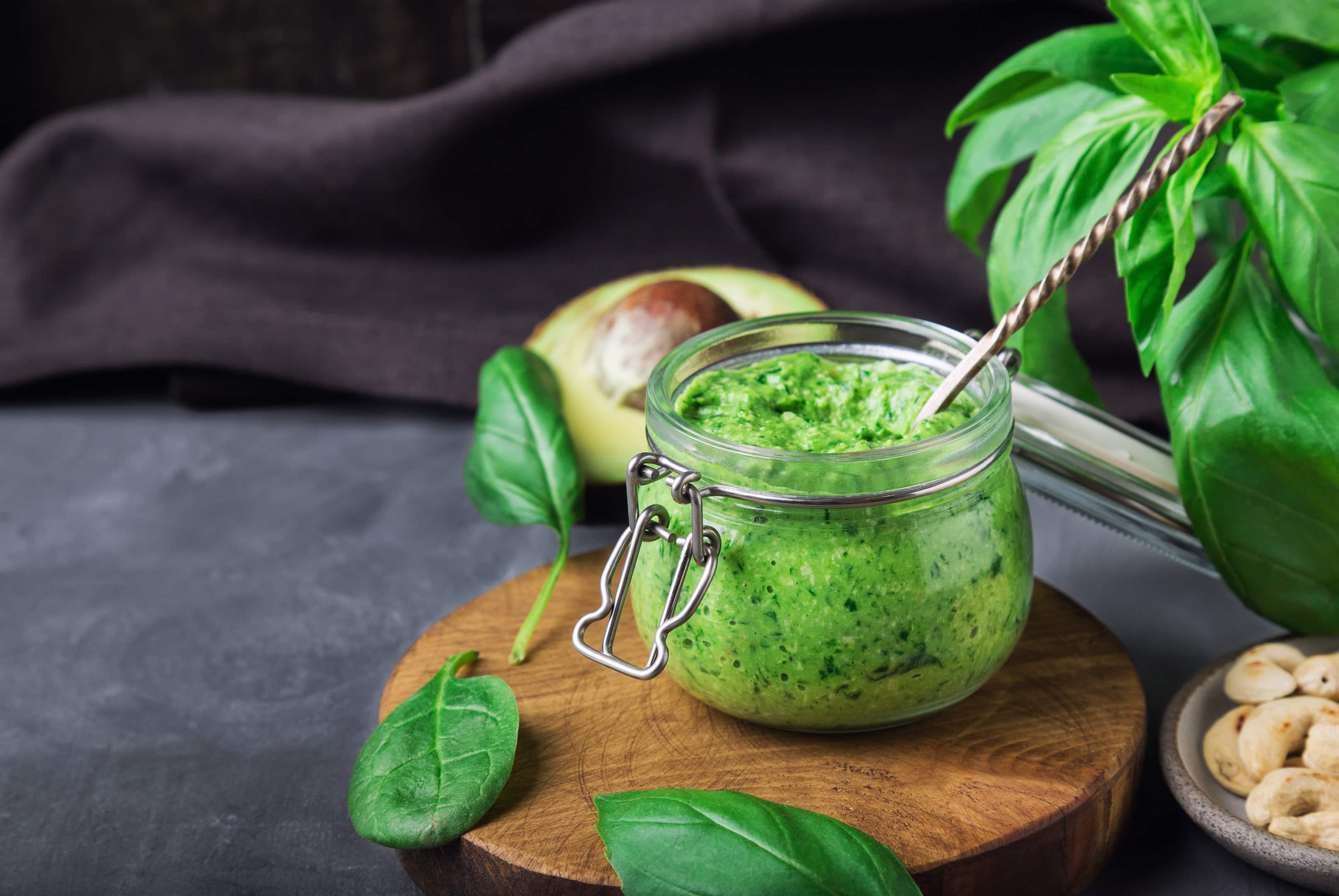 Fresh vegan spinach pesto recipe sauce with basil and pine nuts