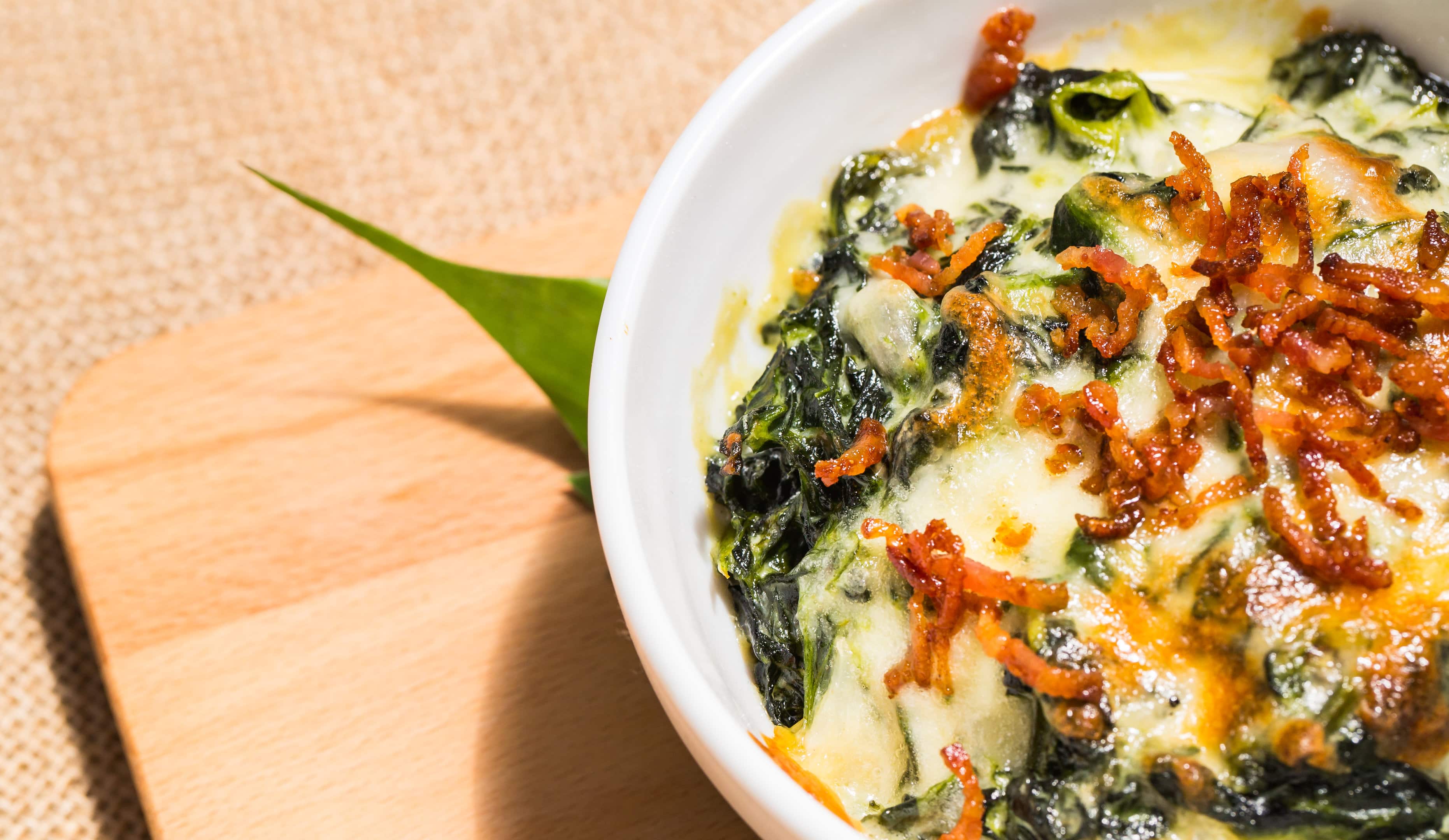 Bowl of fresh Cheddar’s spinach dip recipe with fried minced sweet pork