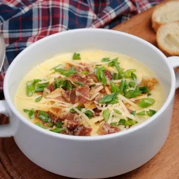 Creamy loaded baked O'Charley's potato soup with bacon cheese green onions