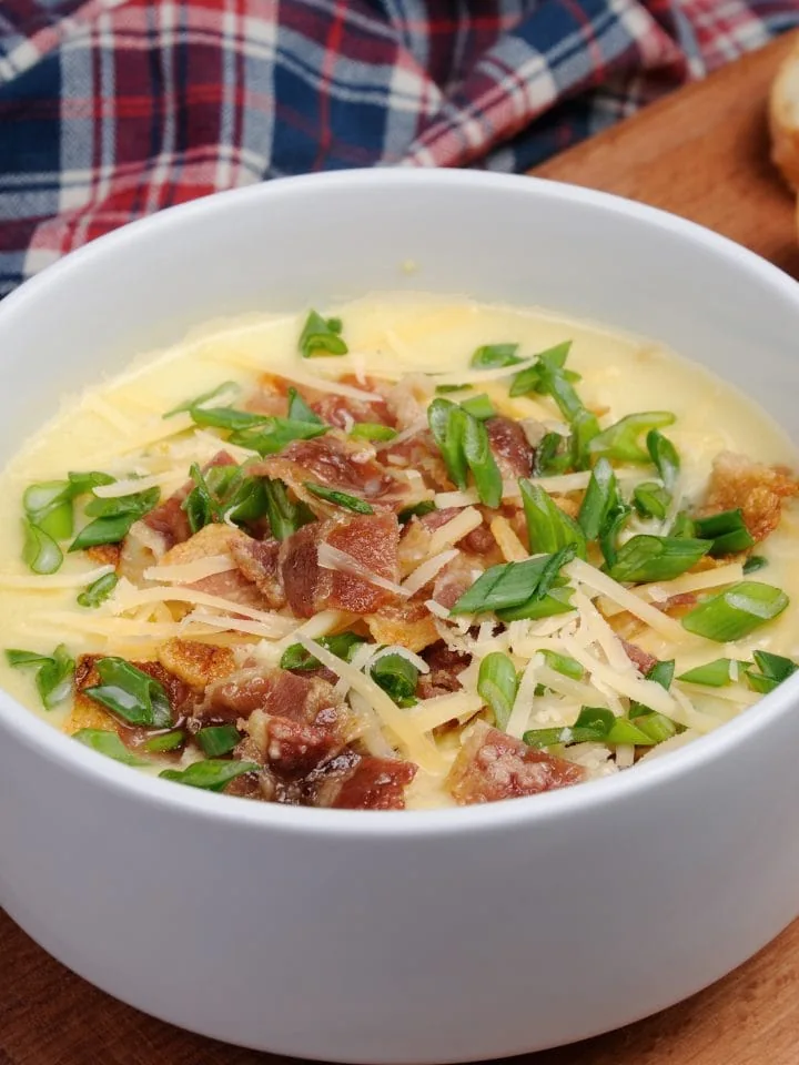 Creamy loaded baked O'Charley's potato soup with bacon cheese green onions