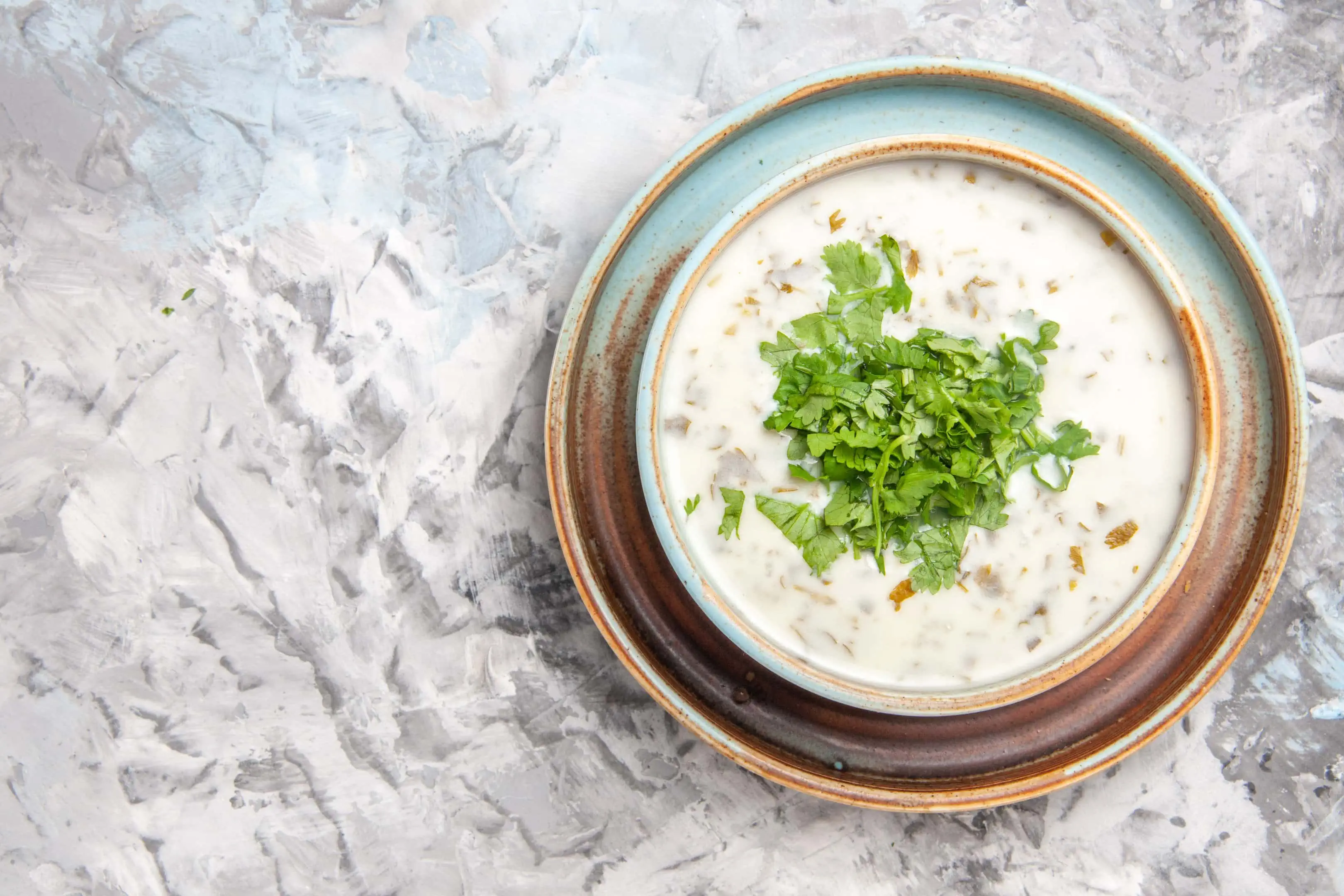 Homemade Dixie Stampede soup recipe garnished with parsley