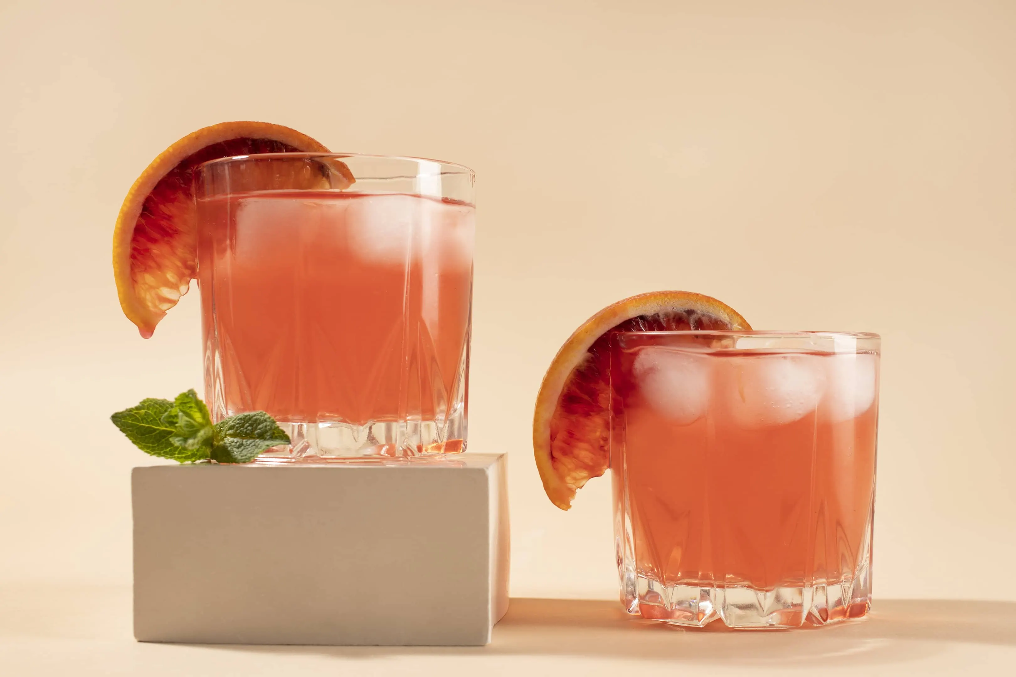 Party Hunch Punch drinks with ice cubes and blood orange