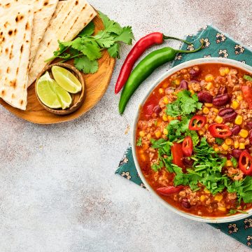 Pioneer Woman taco soup with minced meat, tomato, cilantro and vegetables
