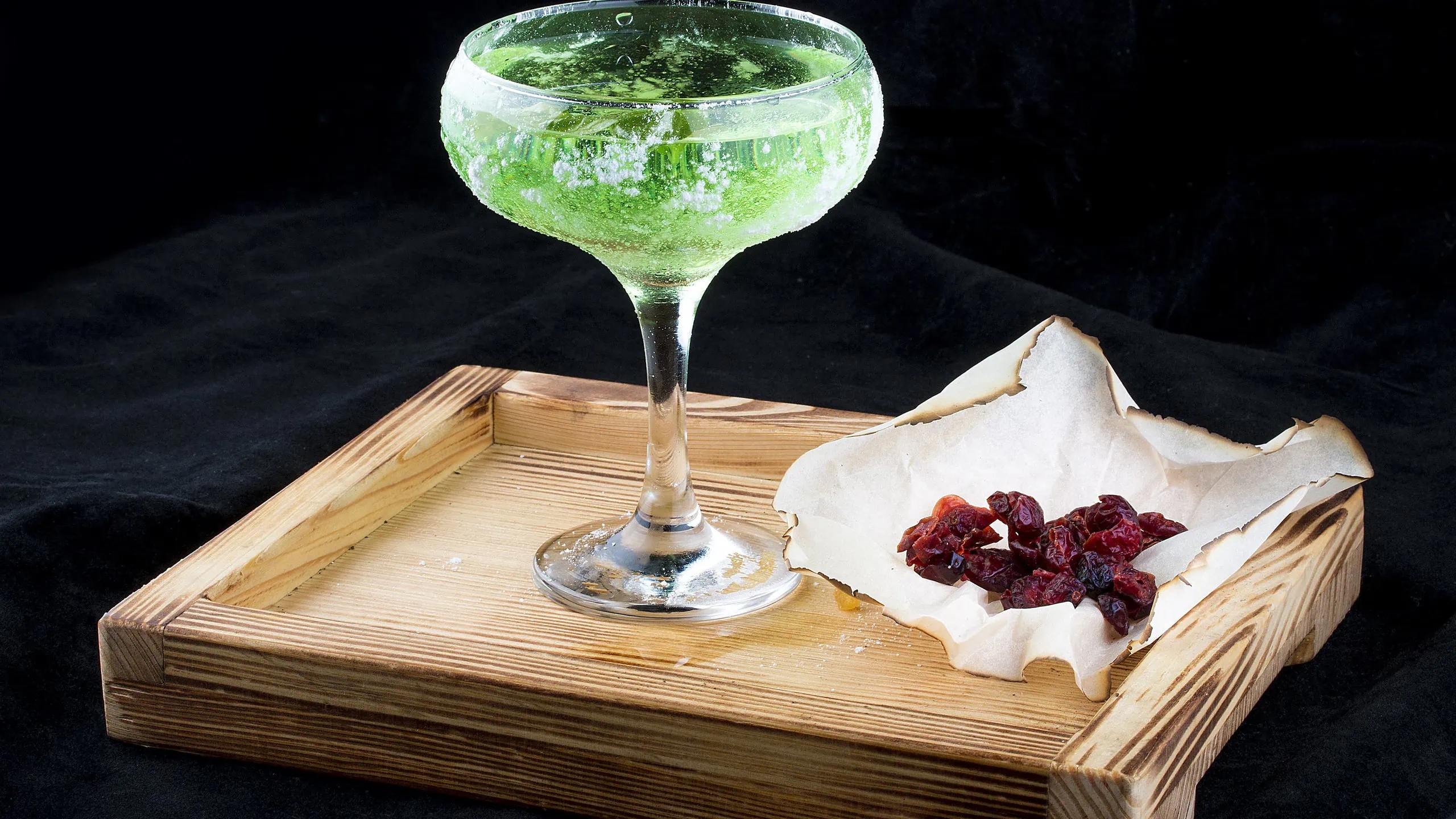 Goblin Glow martini recipe with candied fruit