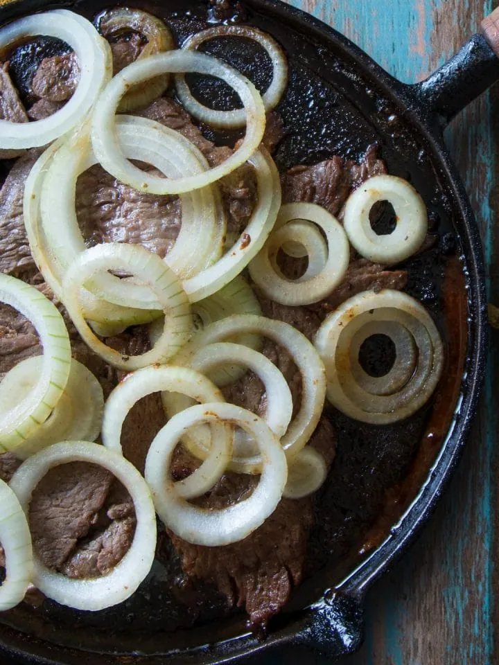 Sizzling beef Pinoy with onions