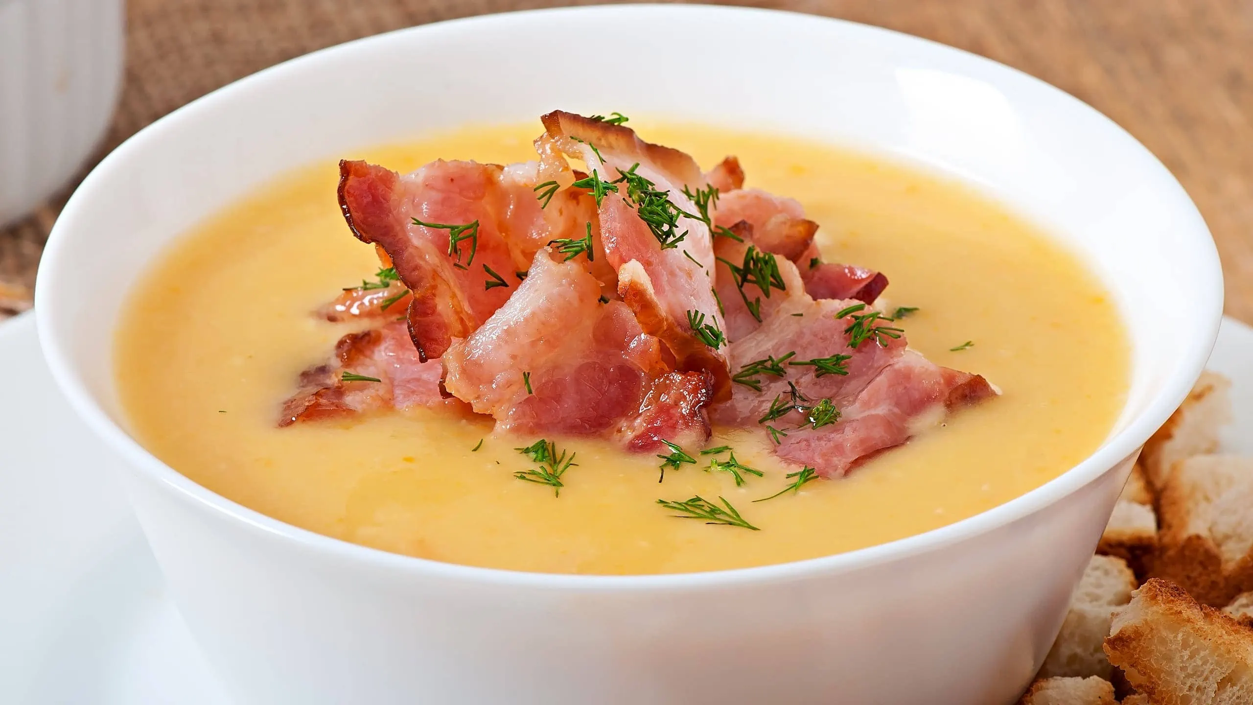 Creamy Rafferty's potato soup recipe paired with fried bacon