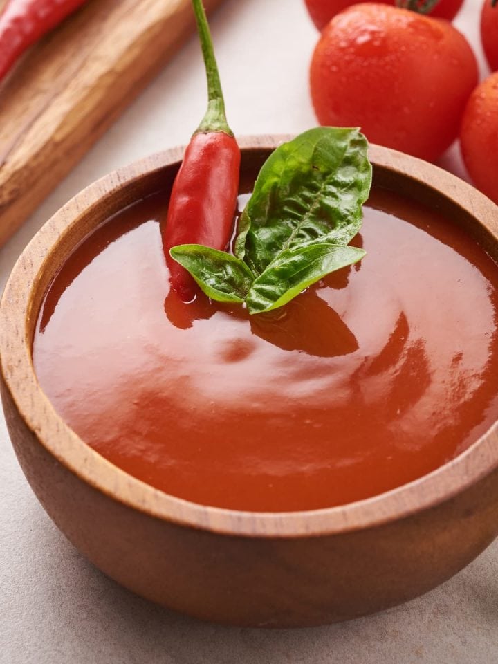 Popular Mexican Valentina hot sauce with chili pepper tomatoes