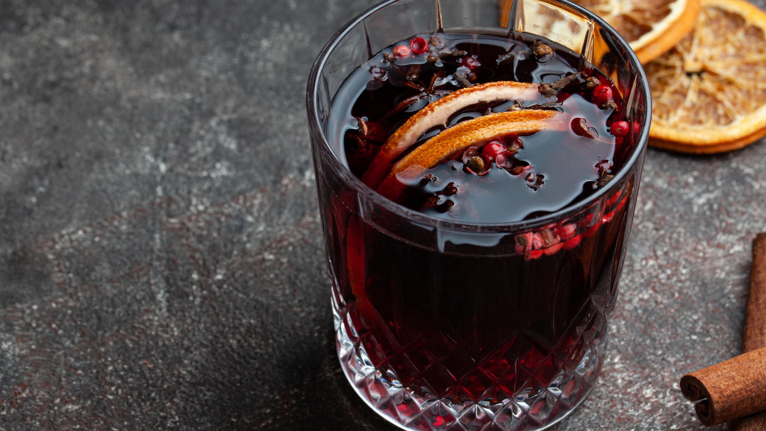 Refreshing Carrabba's blackberry sangria with dried lemon