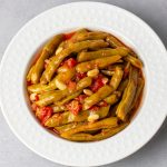 Traditional delicious Bill Miller green bean with chili and tomato sauce