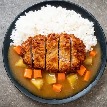 Crispy fried chicken cutlet with Coco's curry and rice