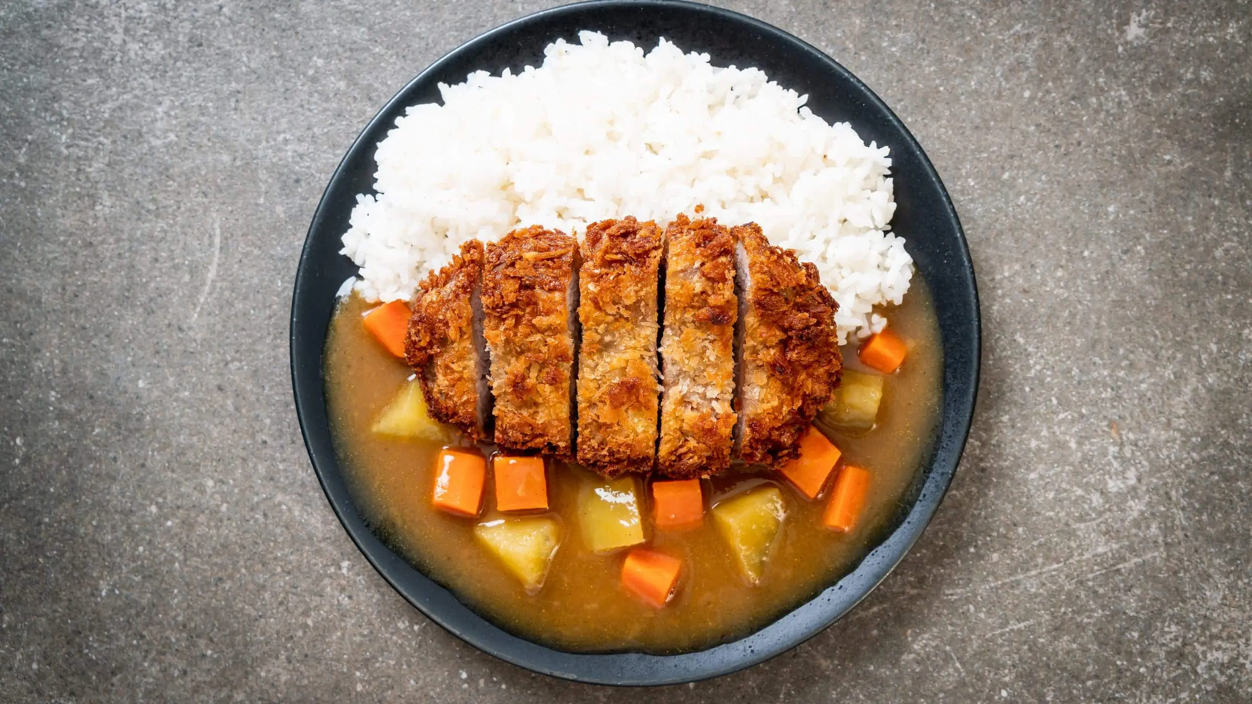 Crispy fried chicken cutlet with Coco's curry recipe and rice