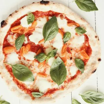 Tasty Vito Iacopelli pizza dough with tomatoes and basil