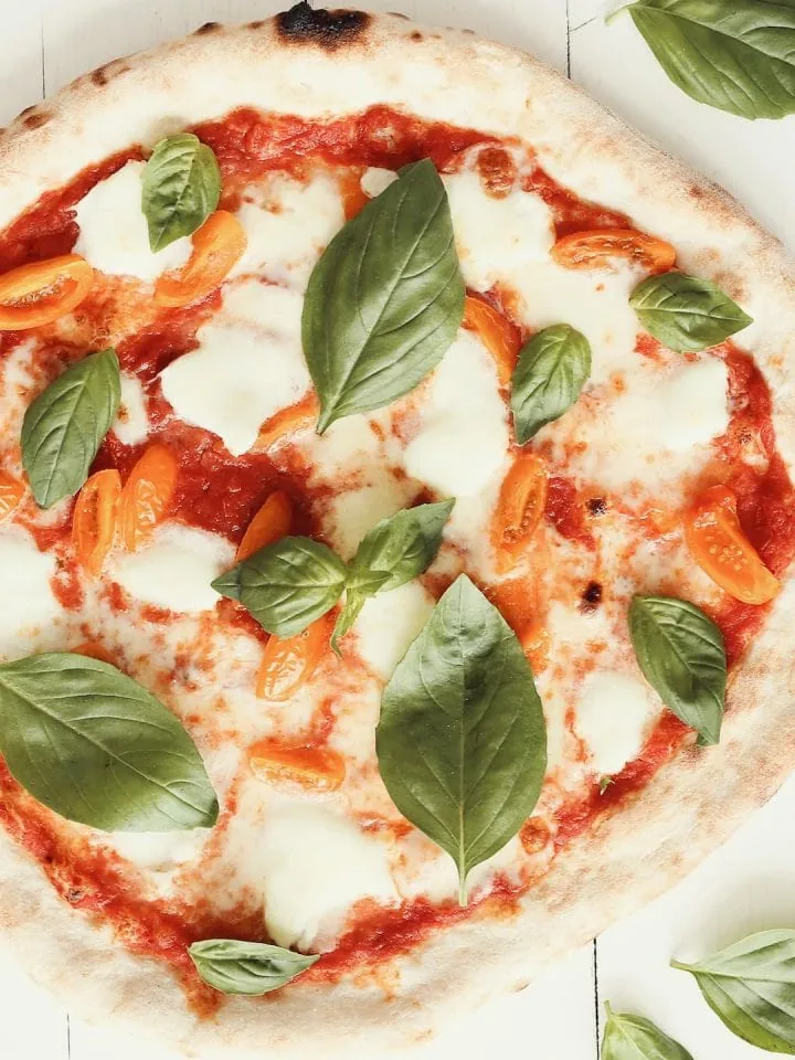 Tasty Vito Iacopelli pizza dough with tomatoes and basil