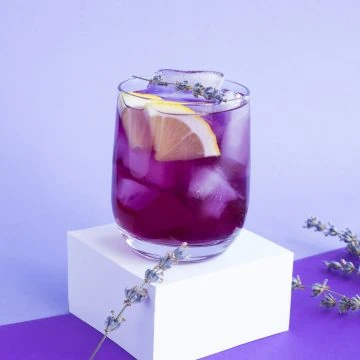 Violet sake with ice and lemon