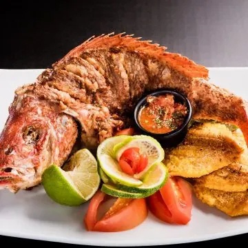 Fried whole red mangrove snapper with lemon